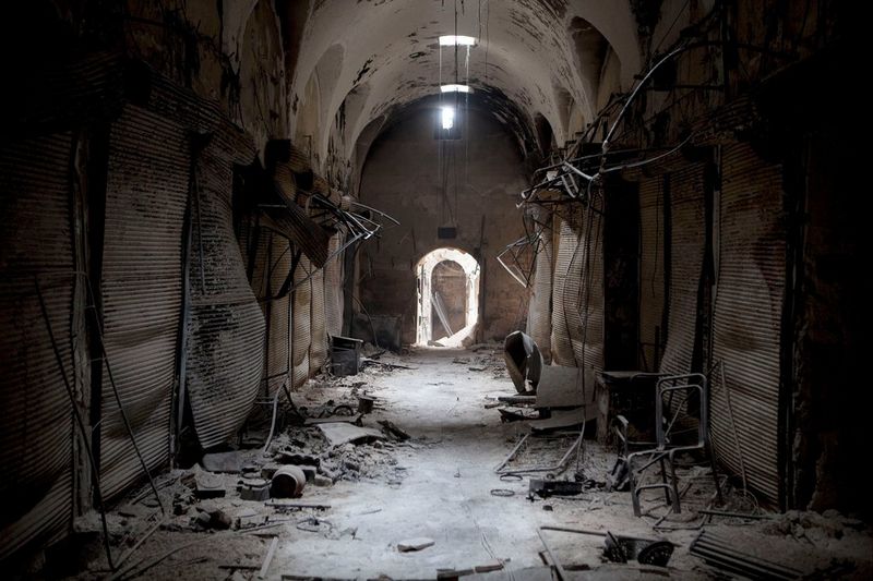 A once-busy souk near Aleppo&#39;s Umayyad Mosque lies in ruins.