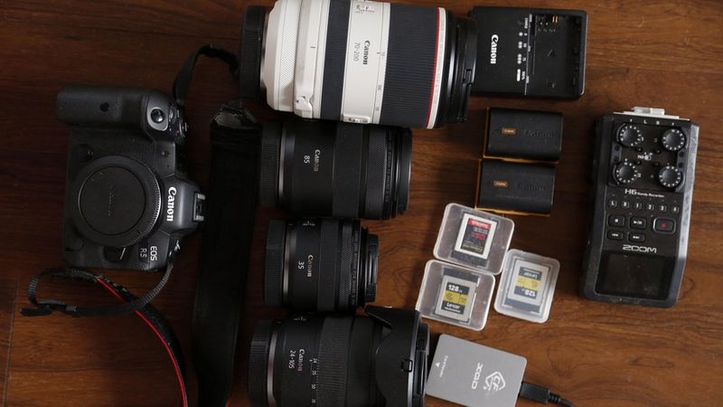 Laura El-Tantawy's kitbag containing Canon cameras, lenses and accessories.