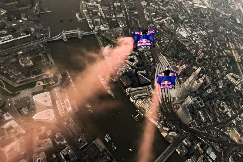 A still from aerial footage of the Red Bull WIngs Through Tower Bridge event, shot on Canon by the third wingsuiter, Peter Salzmann.