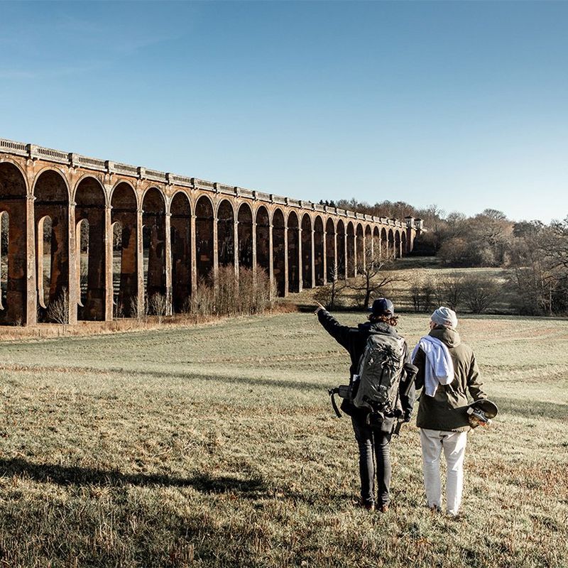 Photographer Lorenz Holder and skateboarder Vladik Scholz look up at the Balcombe Viaduct.