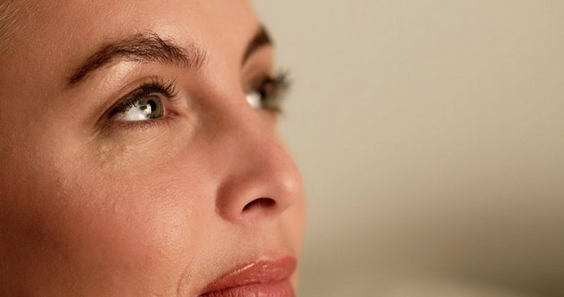 A close-up of a woman's face.