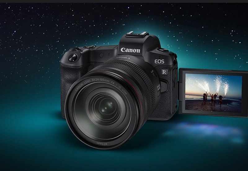 A scenic image of the silhouette of a person in the foreground with a space scene in full colour in the background