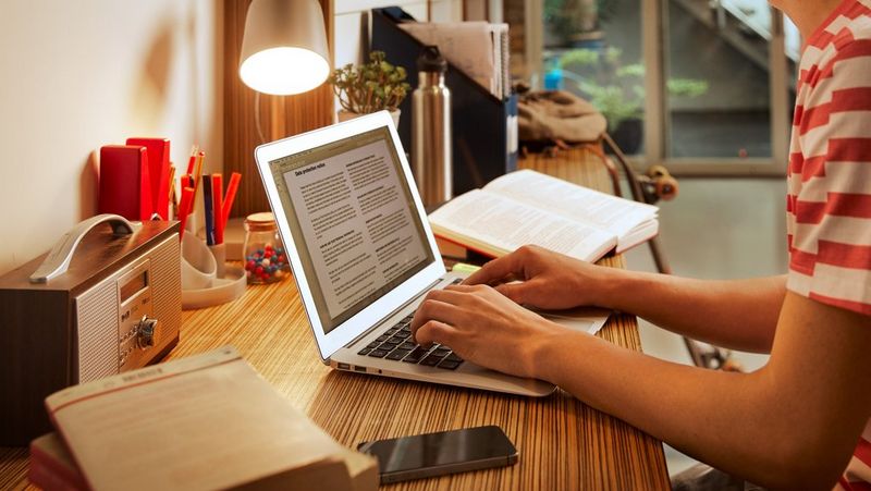Young man in front of laptop