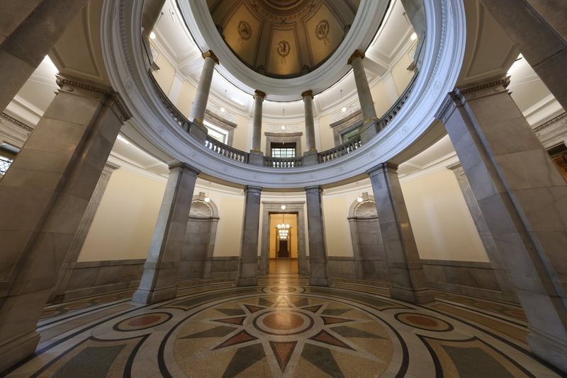 A wide interior captured on a Canon 10-20mm L-series lens, showing columns and walkways, along with the decorative floor and ceiling.