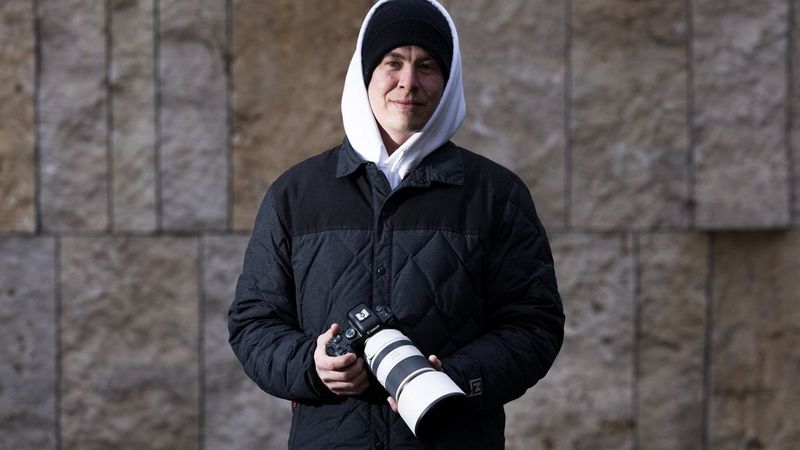 Photographer Lorenz Holder and skateboarder Vladik Scholz beside the base of a viaduct.