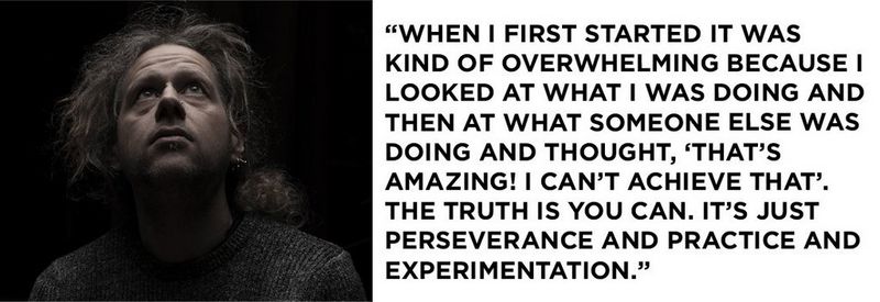 Left: A portrait of Robert Barker against a black background. He looks to the sky, so that the light hits his nose and forehead, while the rest is in the shadows. He has curly hair, tied back into a ponytail and wears a dark t-shirt. On the right, a quote that reads: “When I first started it was kind of overwhelming because I looked at what I was doing and then at what someone else was doing and thought, ‘that’s amazing! I can’t achieve that’. The truth is you can. It’s just perseverance and practice and experimentation.”