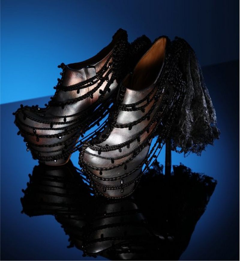 Shoes on blue reflected surface taken on EOS 5D Mark IV