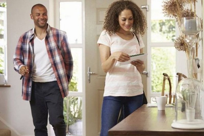 People reading direct mail