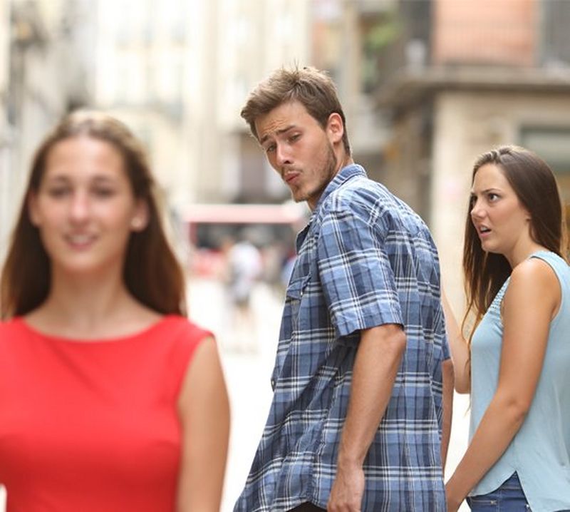 The original famous ‘distracted boyfriend’ image of a young man looking admiringly over his shoulder at a young woman as he walks with his girlfriend. © <a href="http://antonioguillem.com/">Antonio Guillem</a>