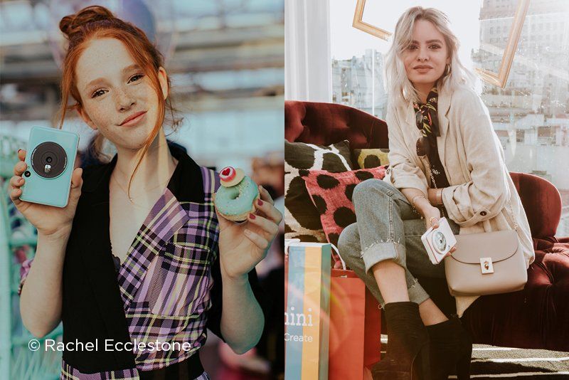 Young woman sitting and holding Canon Zoemini S and a girl holding Canon Zoemini C and a colourful doughnut.