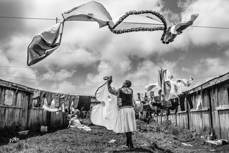 Elizabeth hanging up her washing in Kenia.