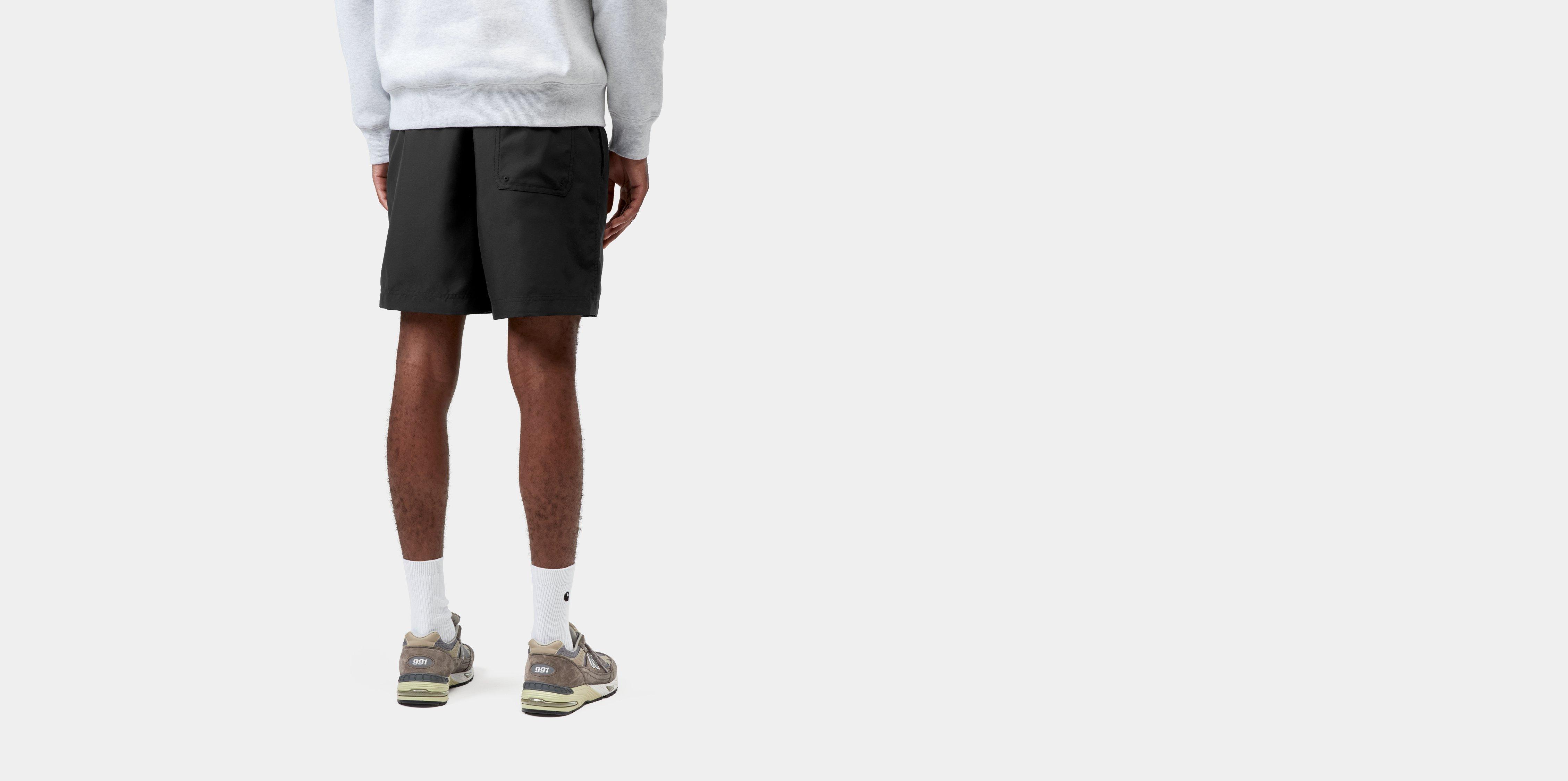 Carhartt WIP Chase Swim Trunks, Black / Gold | Official Online Store