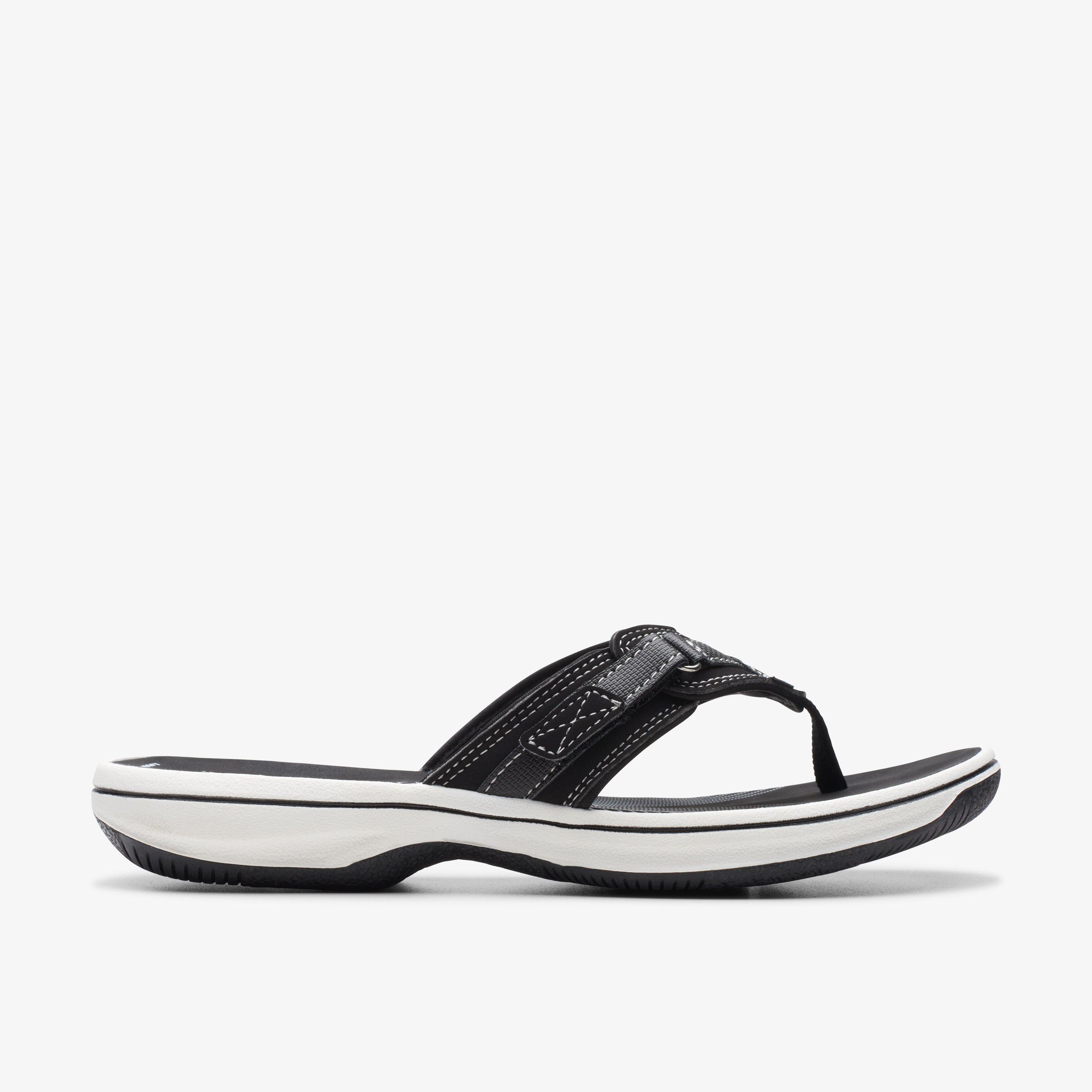 Clarks black store flip flops