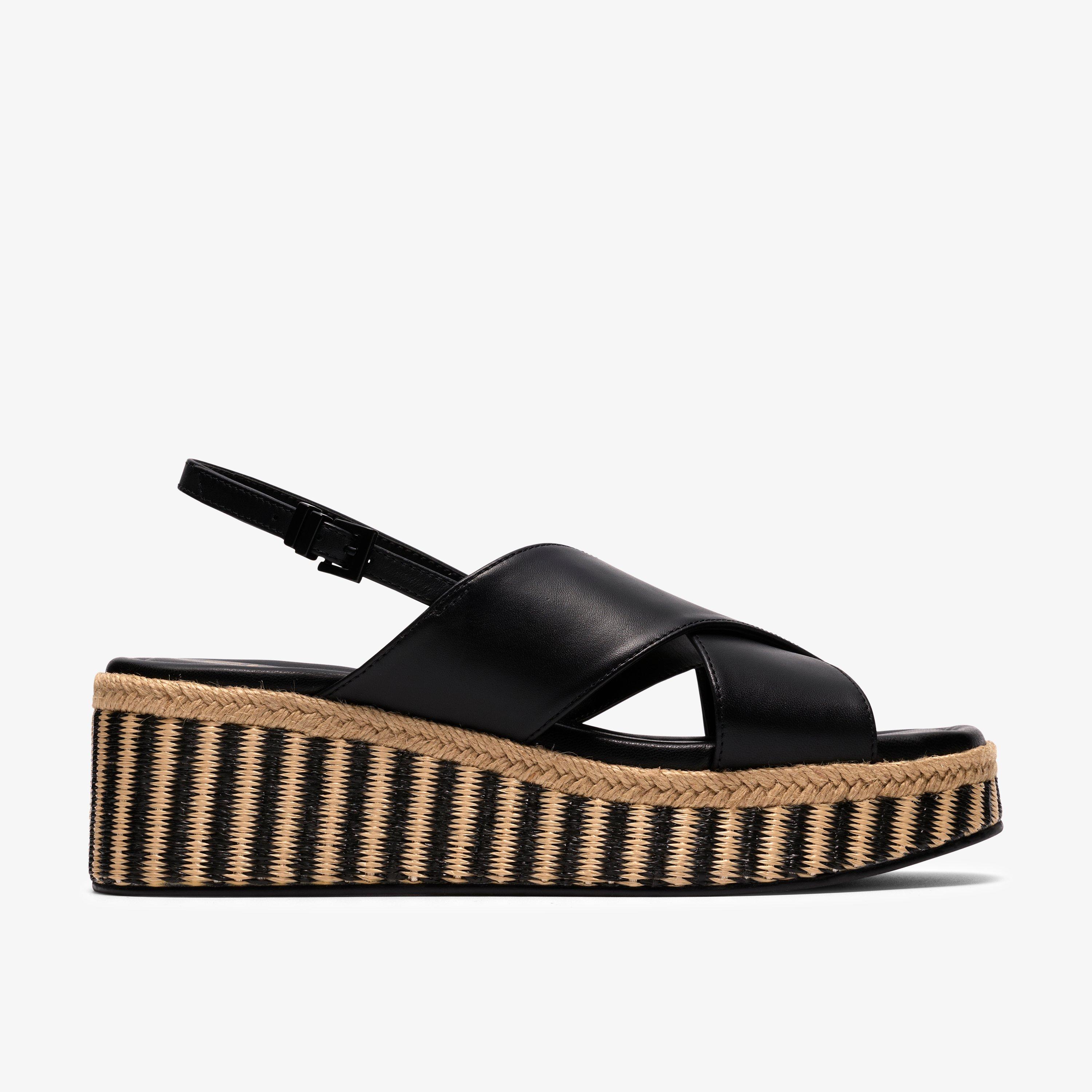 Tessiah Cross Black Interest Wedge Sandals, view 1 of 6