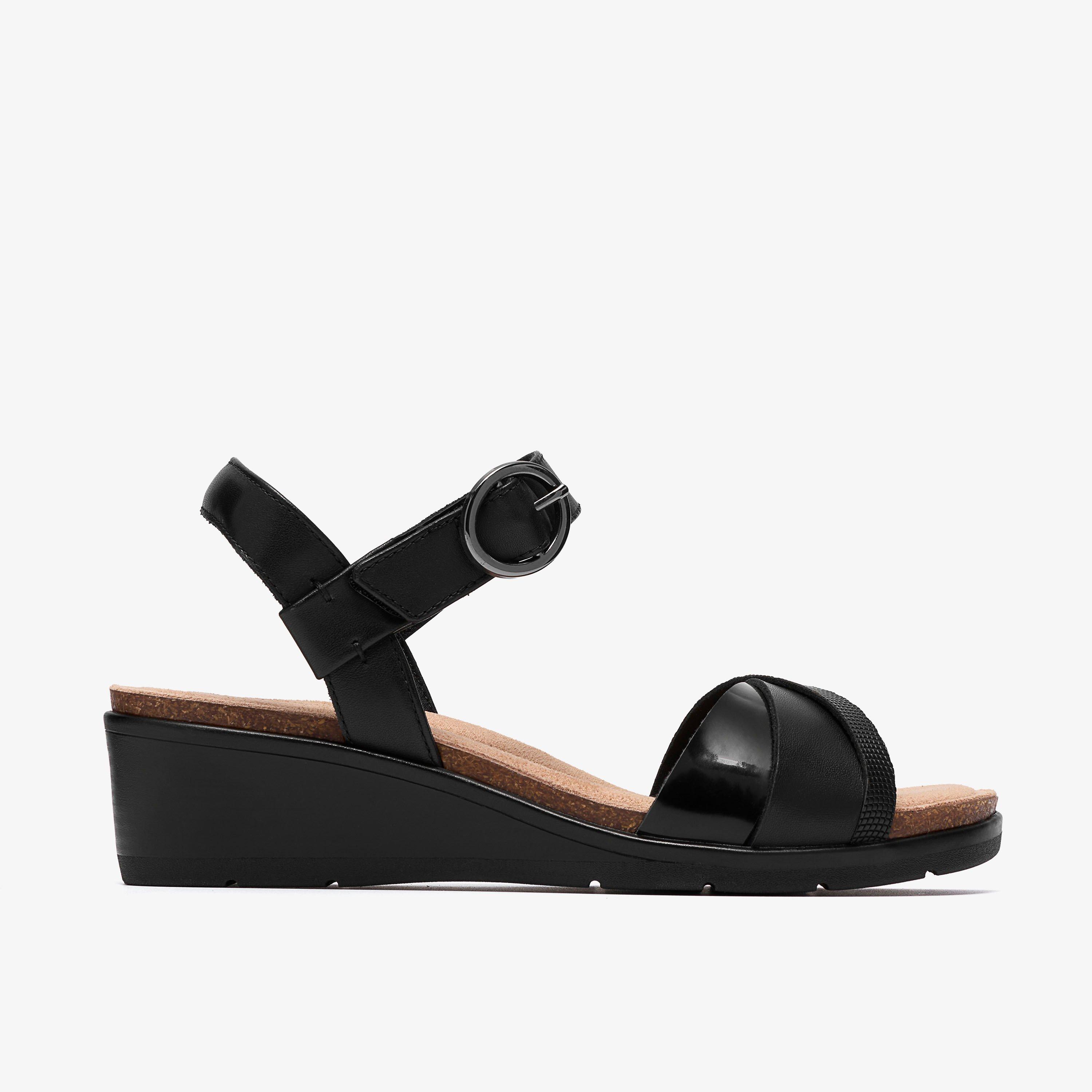 Kacha Twist Black Leather Wedges, view 1 of 6