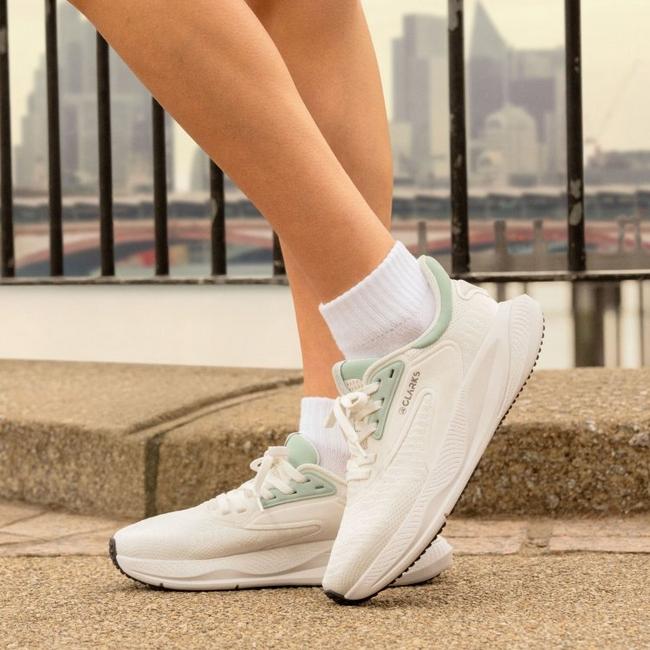 Clarks women's Pace Move white trainers.