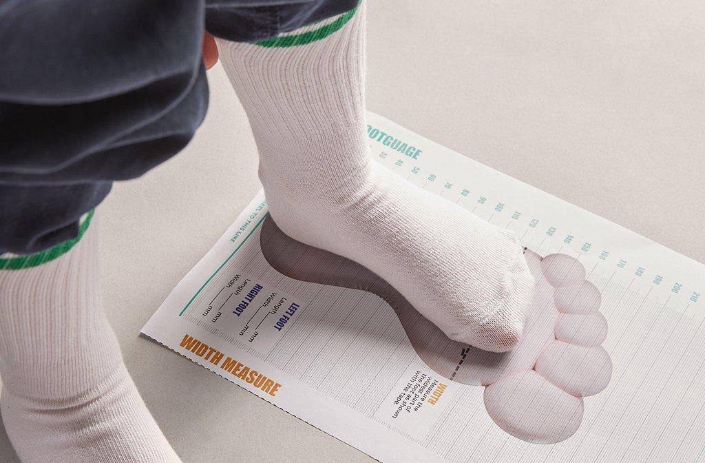 Clarks printed guide used to measure a child's foot