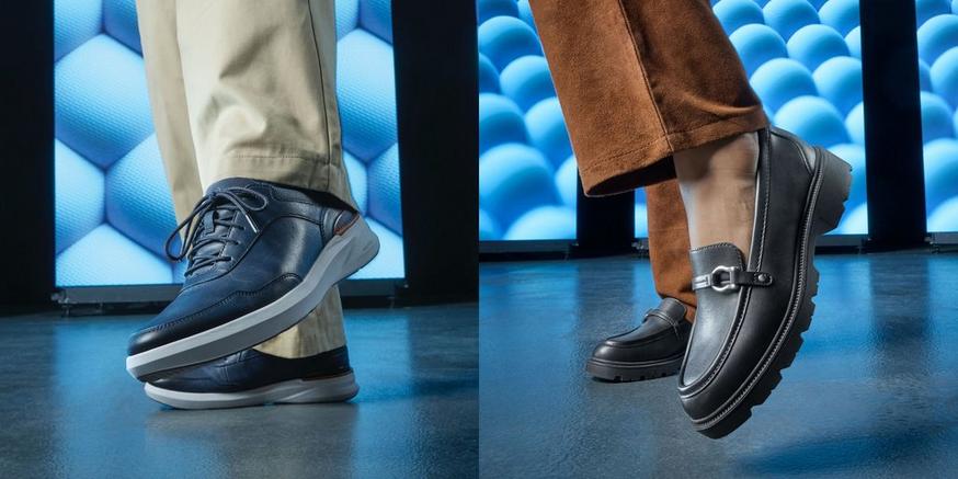 Navy Clarks Code H Vibe lace-up shoes with light trousers beside black Code L Step buckle loafers with brown trousers.