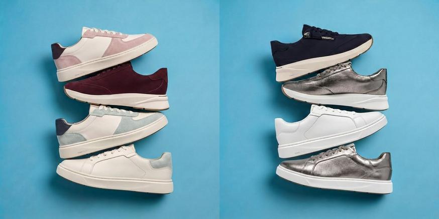 Two arrangements of Clarks trainers in pink, burgundy, grey, white, navy and metallic finishes against a blue background.
