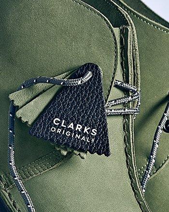 Close up of the Clarks Originals fob on the olive Trek Hi