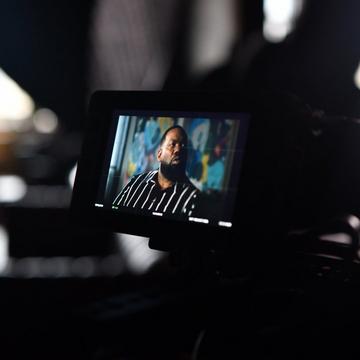 View of Raekwon through the camera monitor