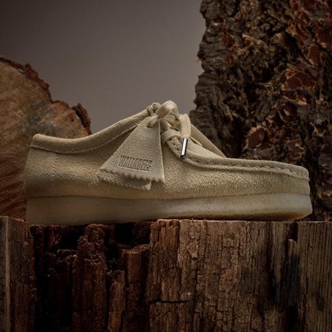 Clarks Wallabee positioned on a wooden block