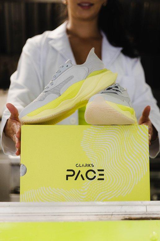 A pair of Clarks Pace shoes on a branded shoe box