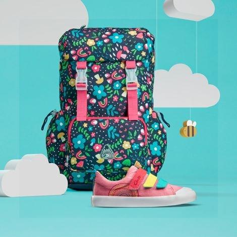 Backpack and a Foxing Lo Beau Kid Pink shoe on a blue background with clouds.