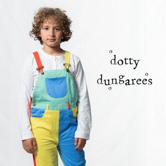 Child wearing colourful patchwork Dotty Dungarees dungarees