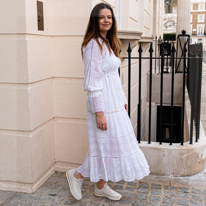 Beulah founder posing wearing clarks shoes