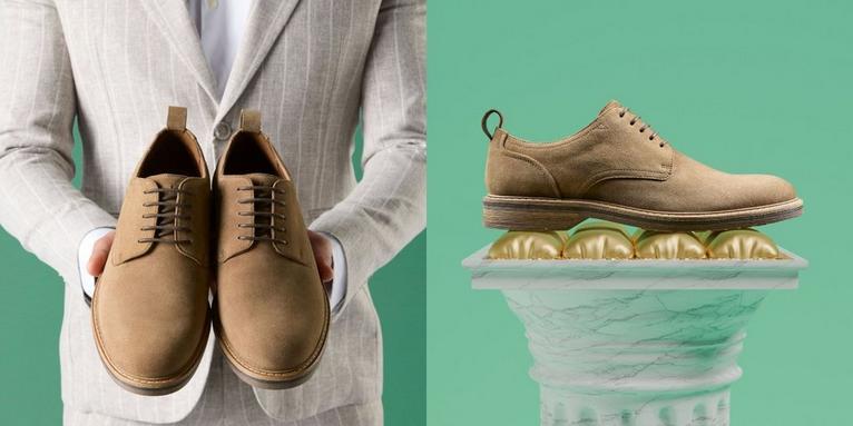 Man holding Aldwin Lace tan suede dress shoes with Contour Cushion Technology