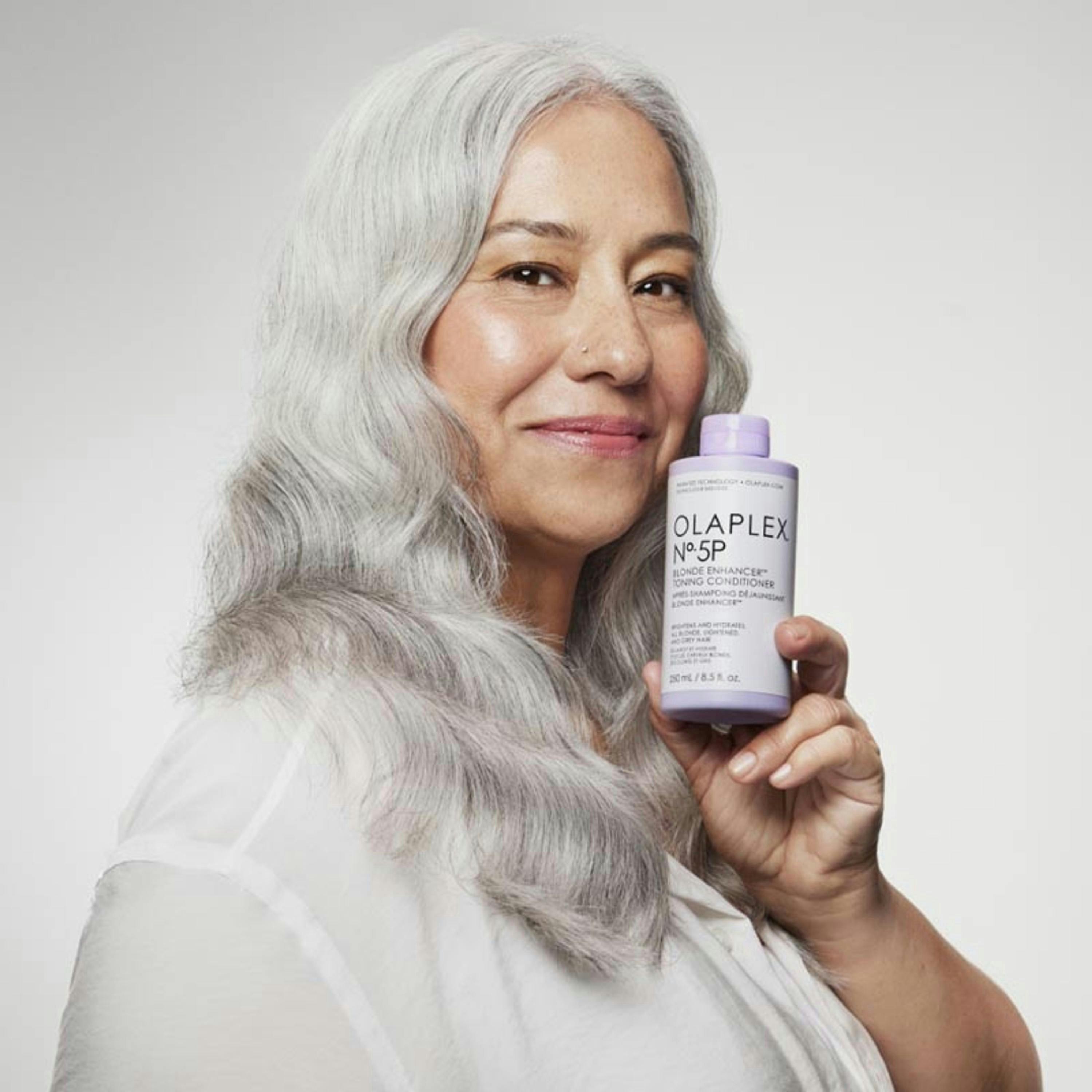 Olaplex No.4P Blonde Enhancer Shampoo and No.5P Conditioner Duo 250 ml Duo , view 6 of 6