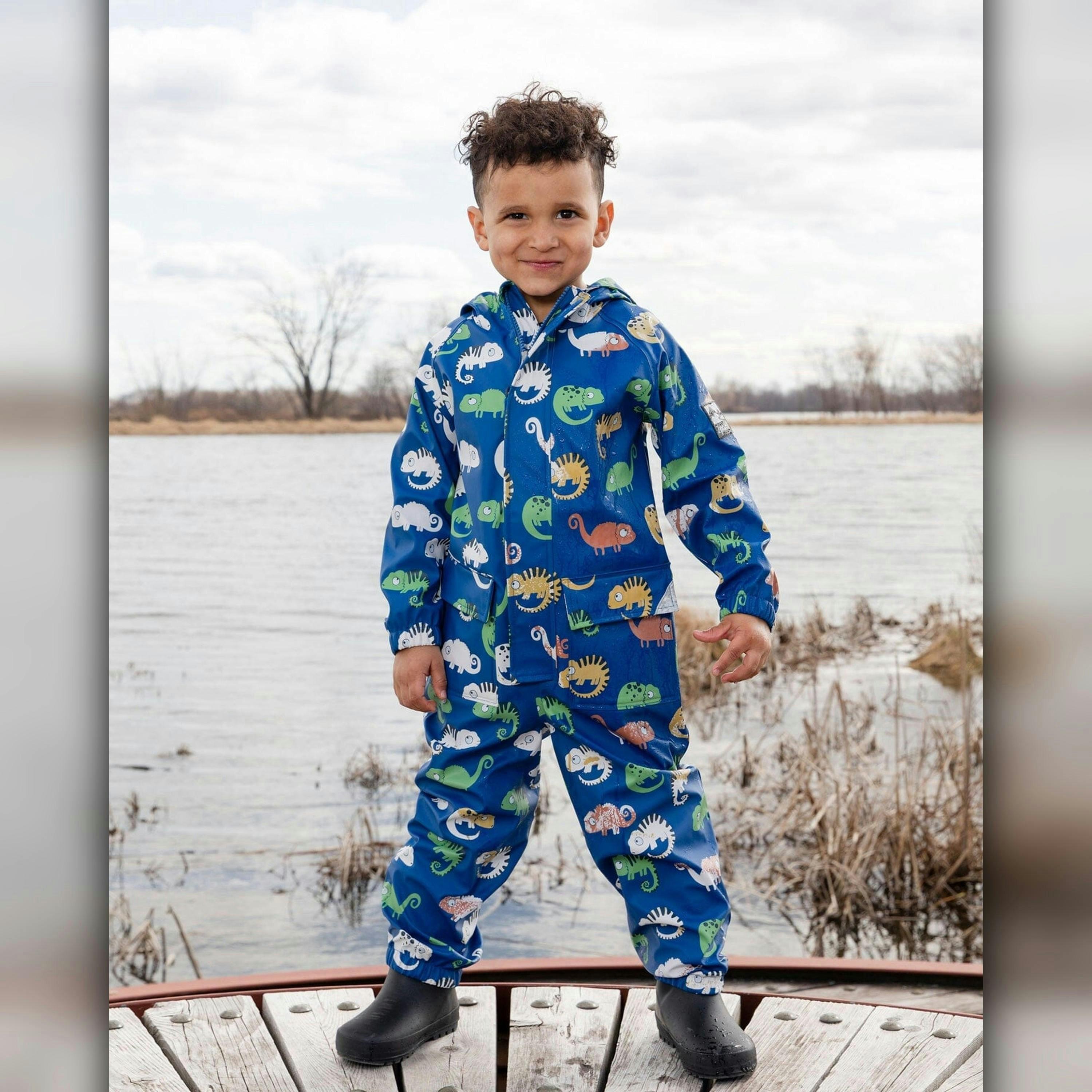 Blue rain jumpsuit with color-changing chameleon print , view 2 of 6