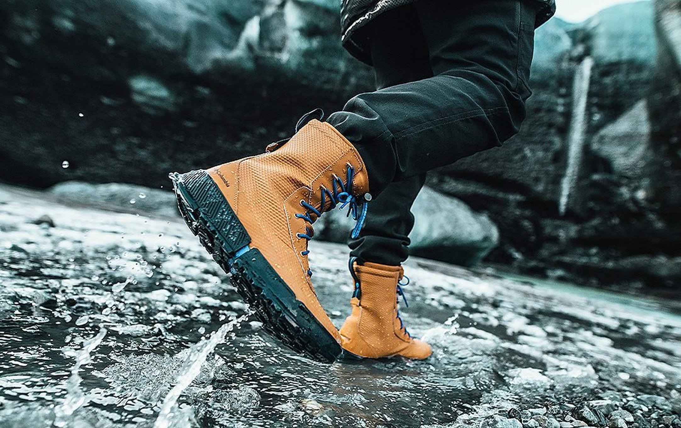 Close up of lace up boots on a wet day.