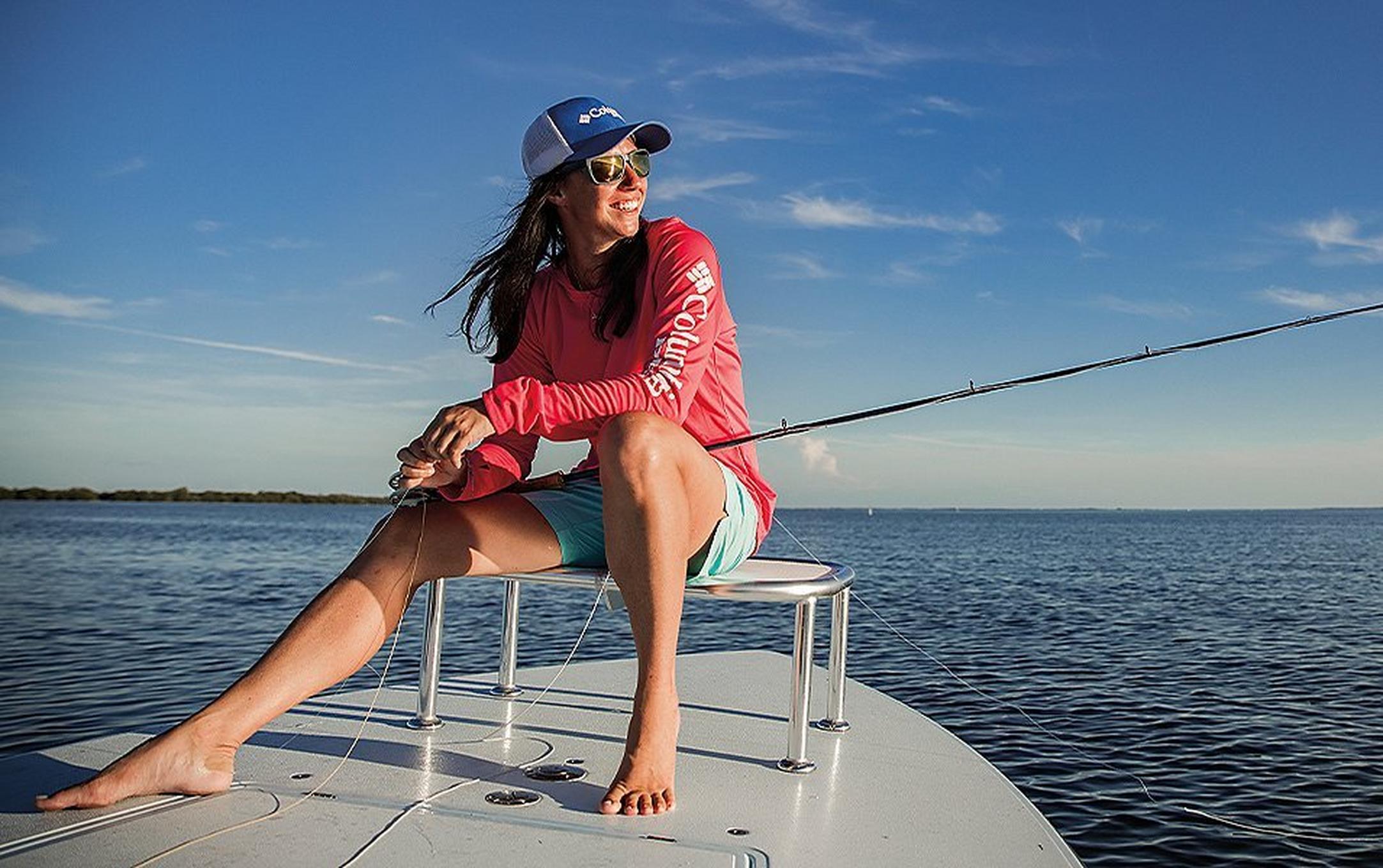 Wesley Locke sitting on a boat enjoying an afternoon on the open water.
