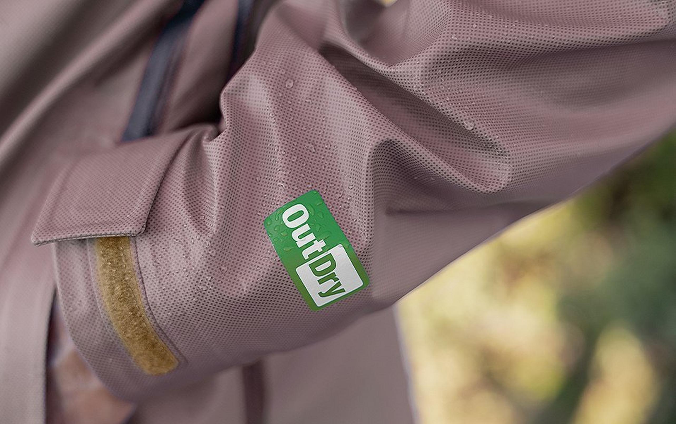 The logo of Columbia Sportswear’s OutDry™ Extreme technology is pictured on the sleeve of a rain jacket.