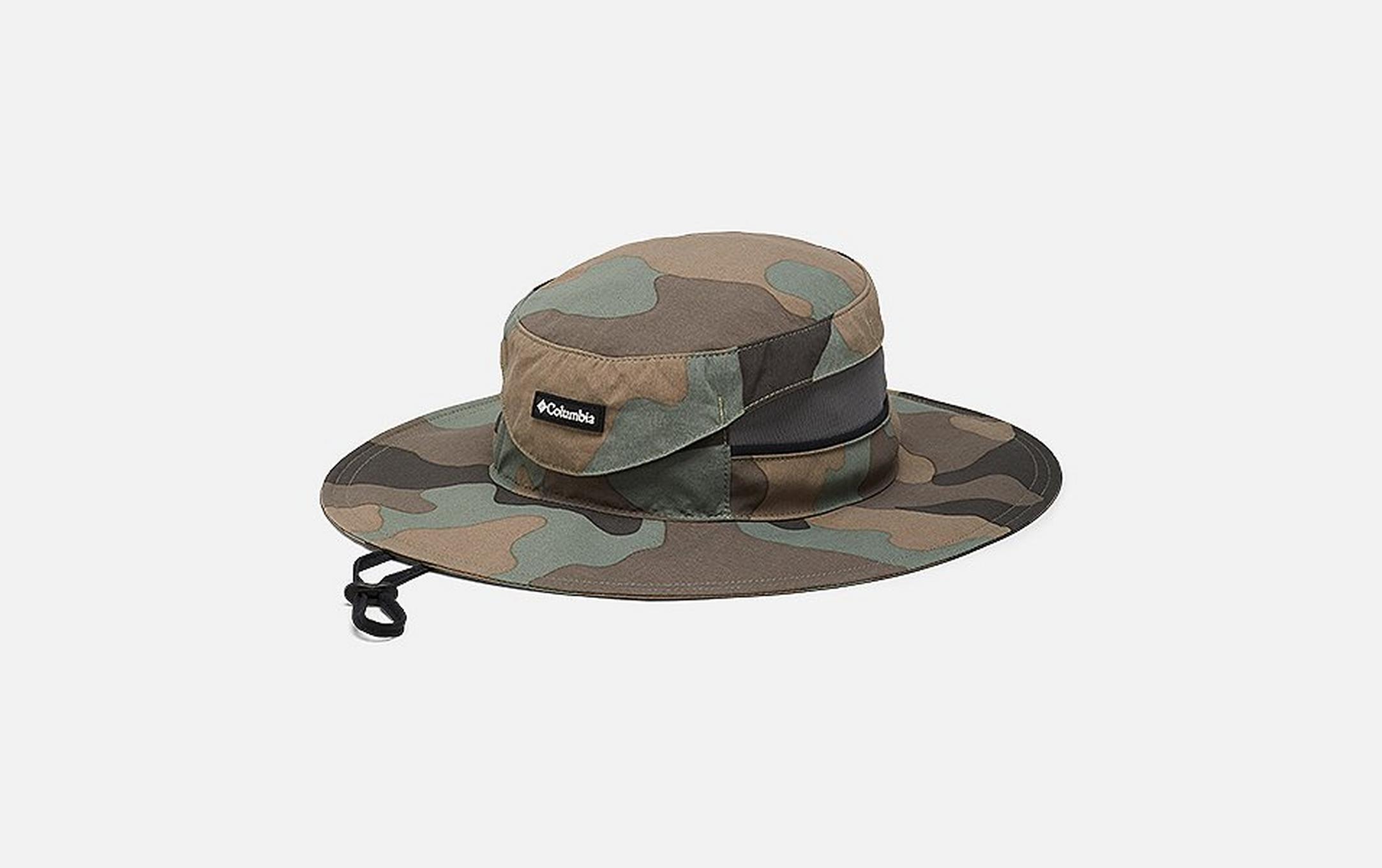 A product shot of a camo-colored Columbia Sportswear booney hat set against a white background.