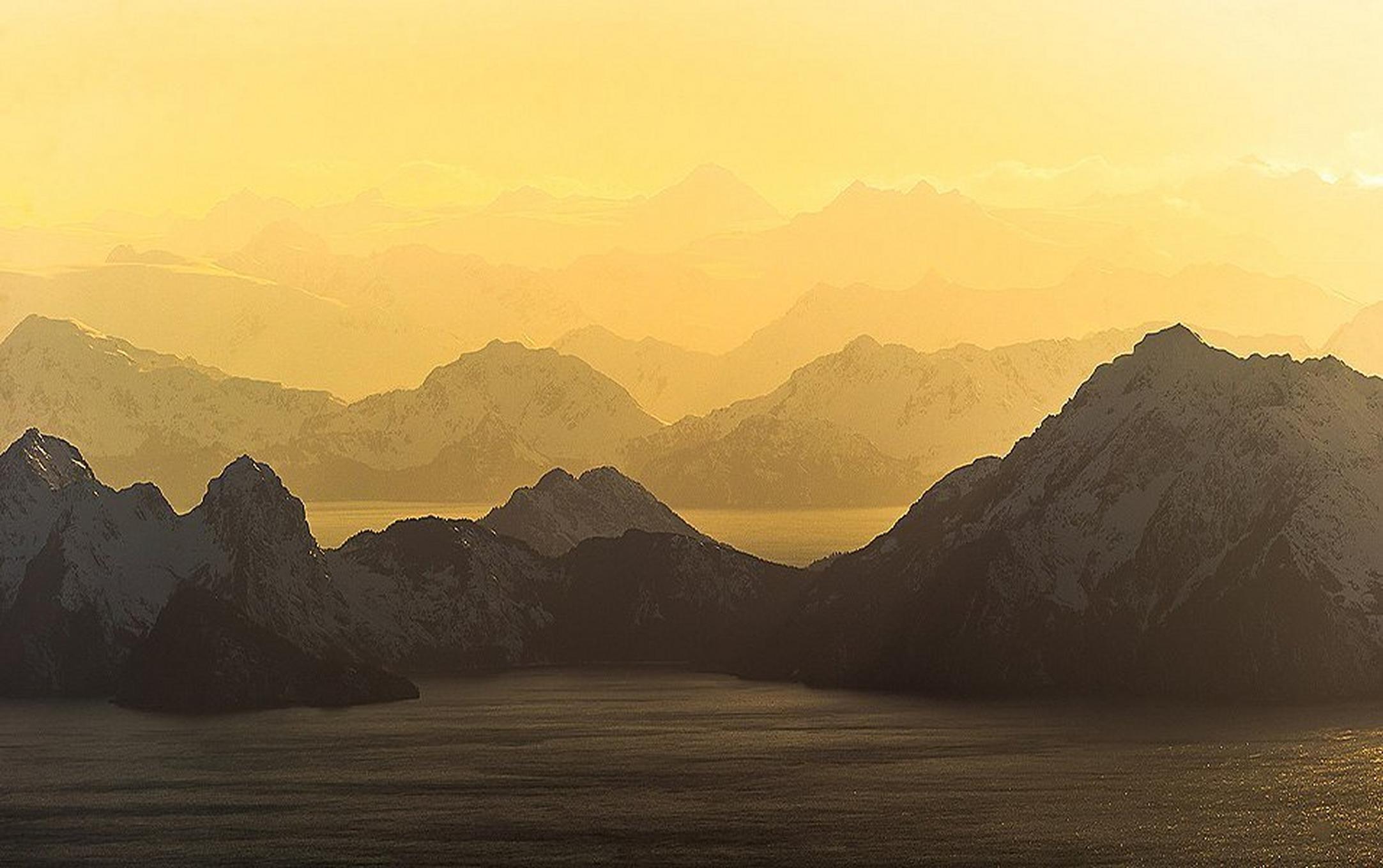 Snowy mountain sunset.