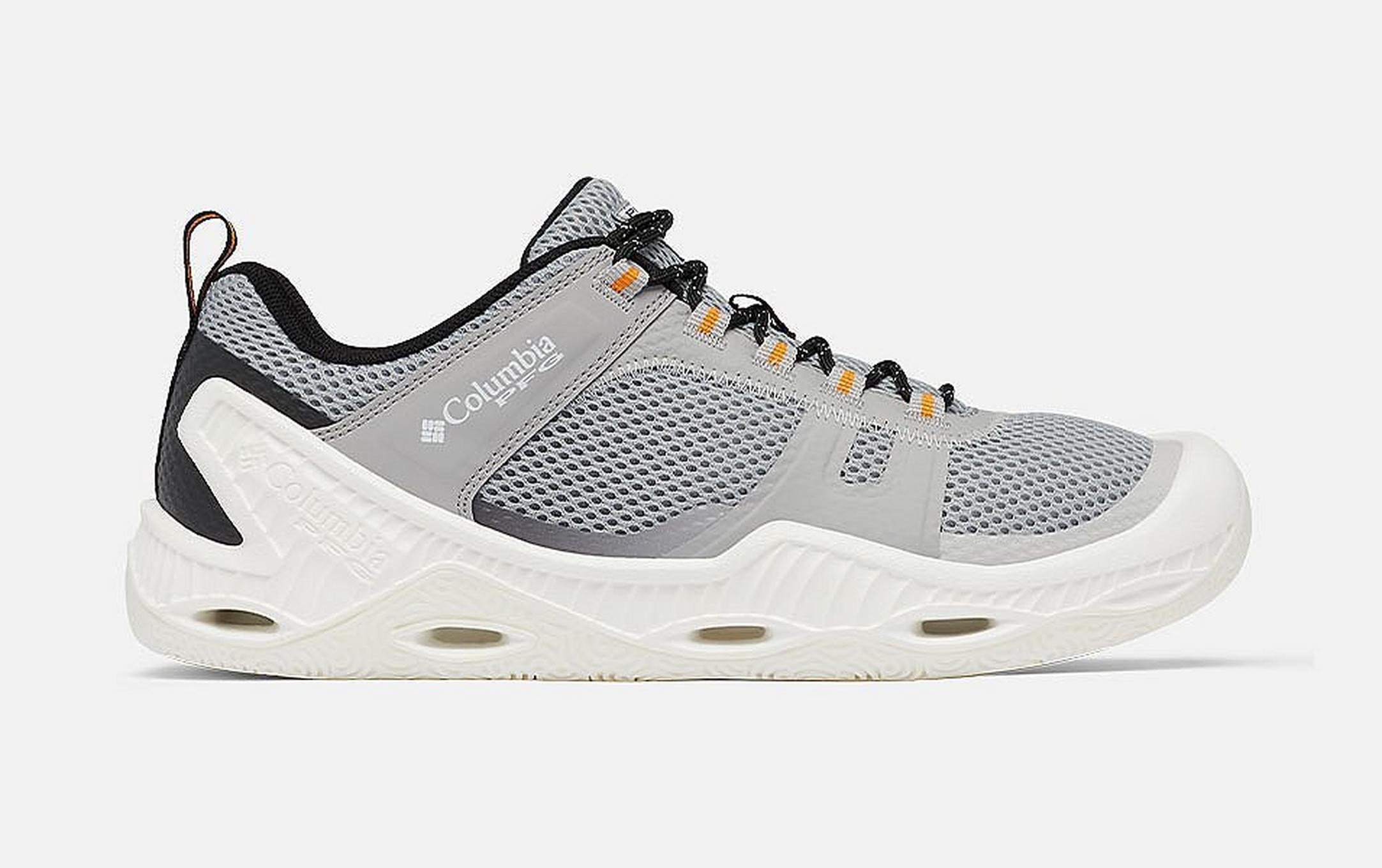 Product shot of Columbia Sportswear’s Men’s Low Drag PFG shoe set against a white background.