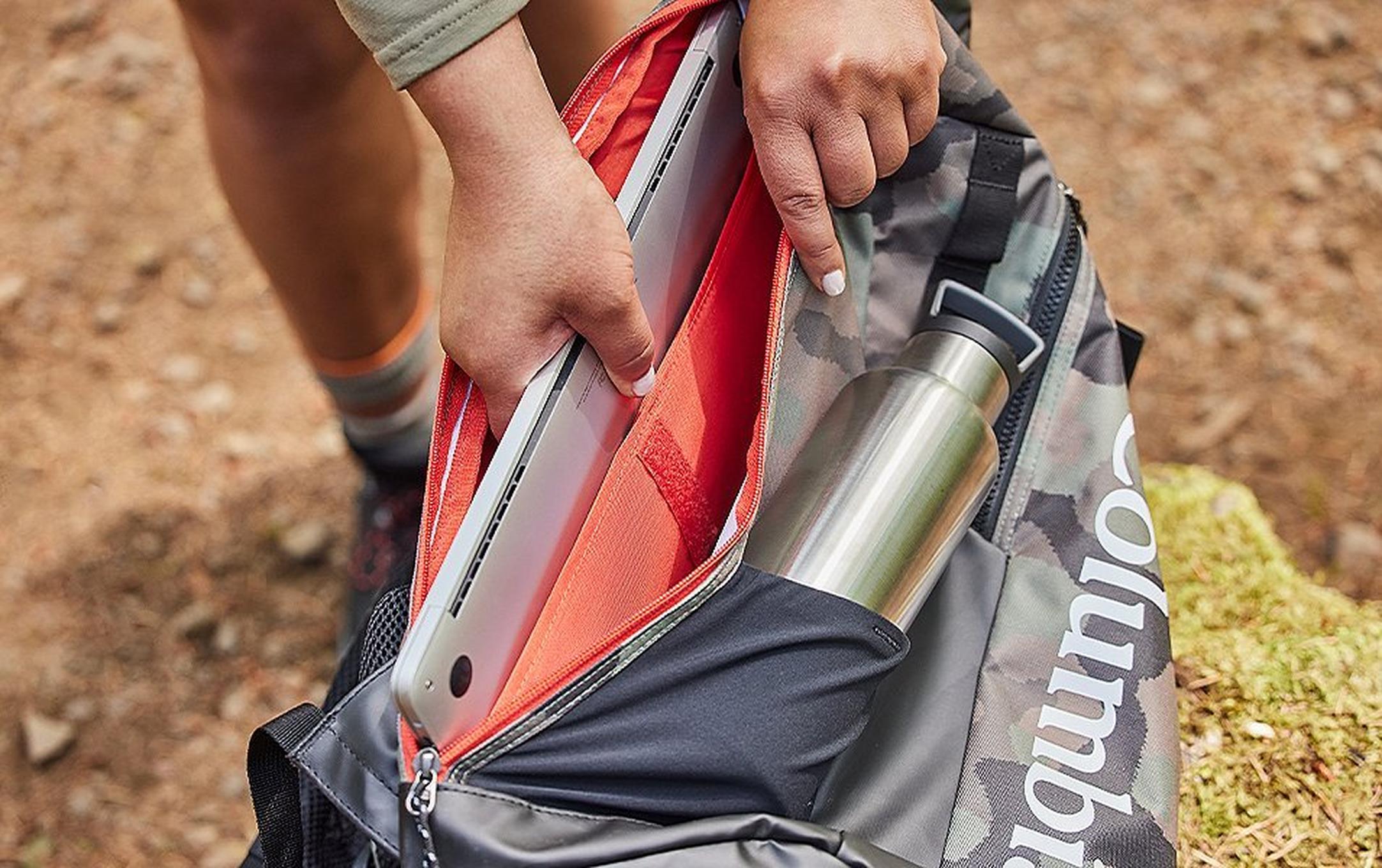 Close up of a Columbia backpack being opened.