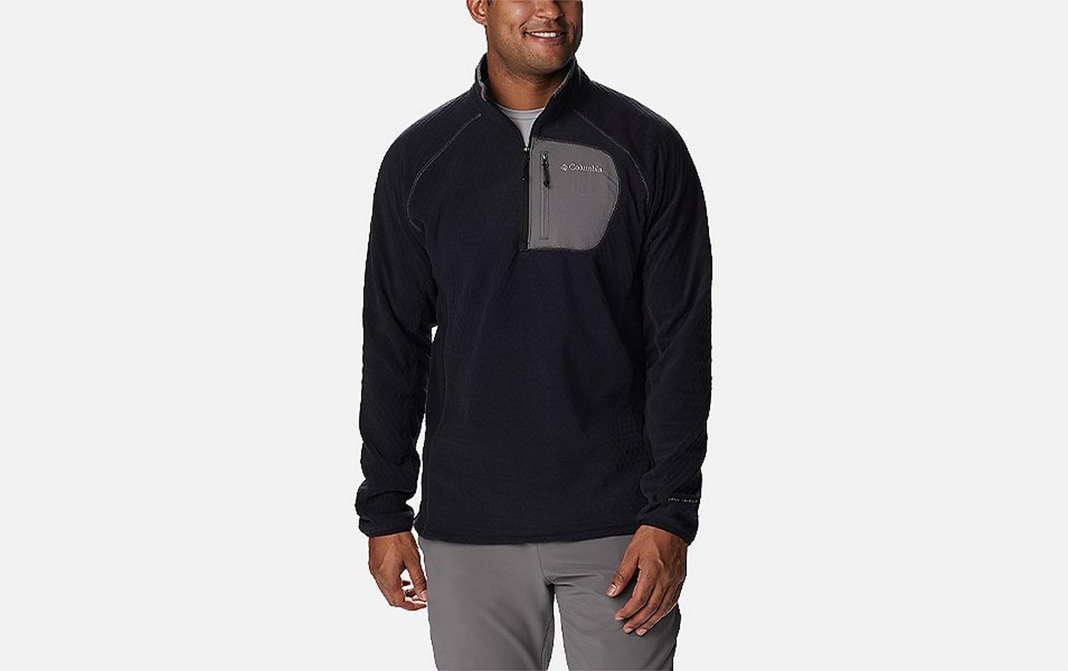 A product image of a man wearing Columbia Sportswear’s Outdoor Tracks Half Zip Fleece Pullover against a white background.