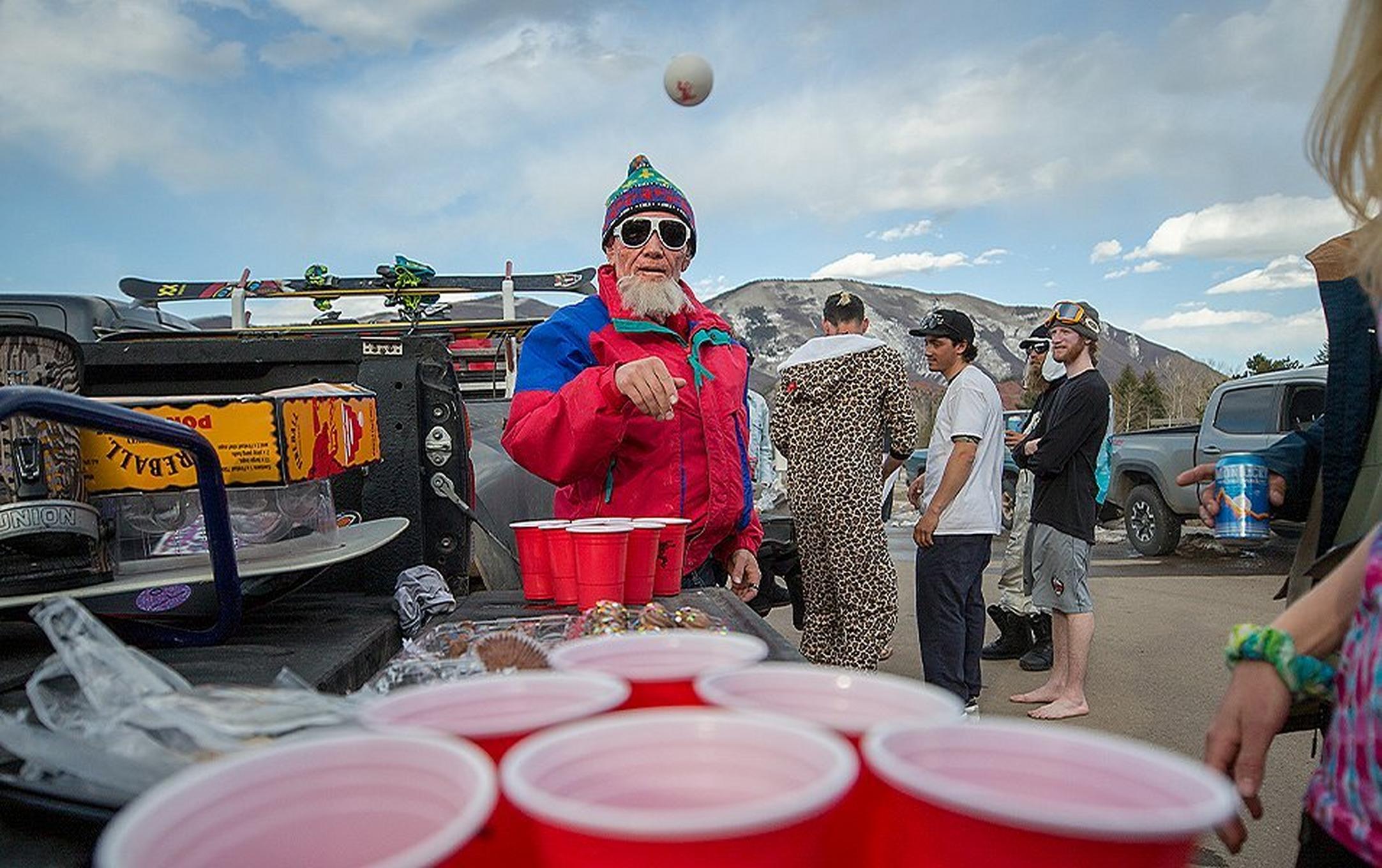 Hotdog Hans is pictured playing beer pong in the parking lot of an Aspen ski resort.