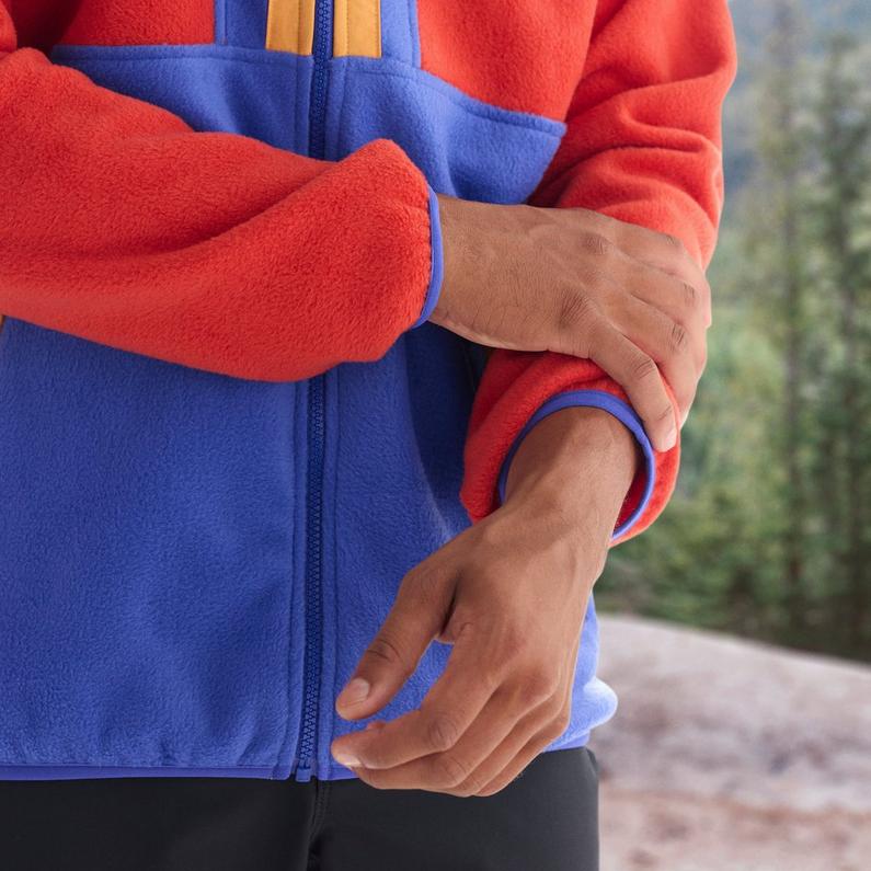 Model adjusting the binding on their cuffs.