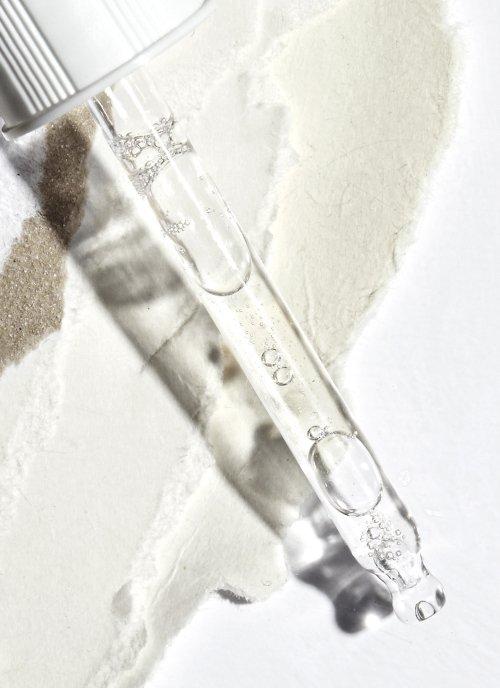 Swatches of different coloured serums for The Ordinary