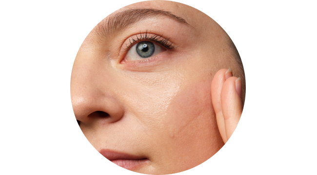 Person applying The Ordinary serum to face