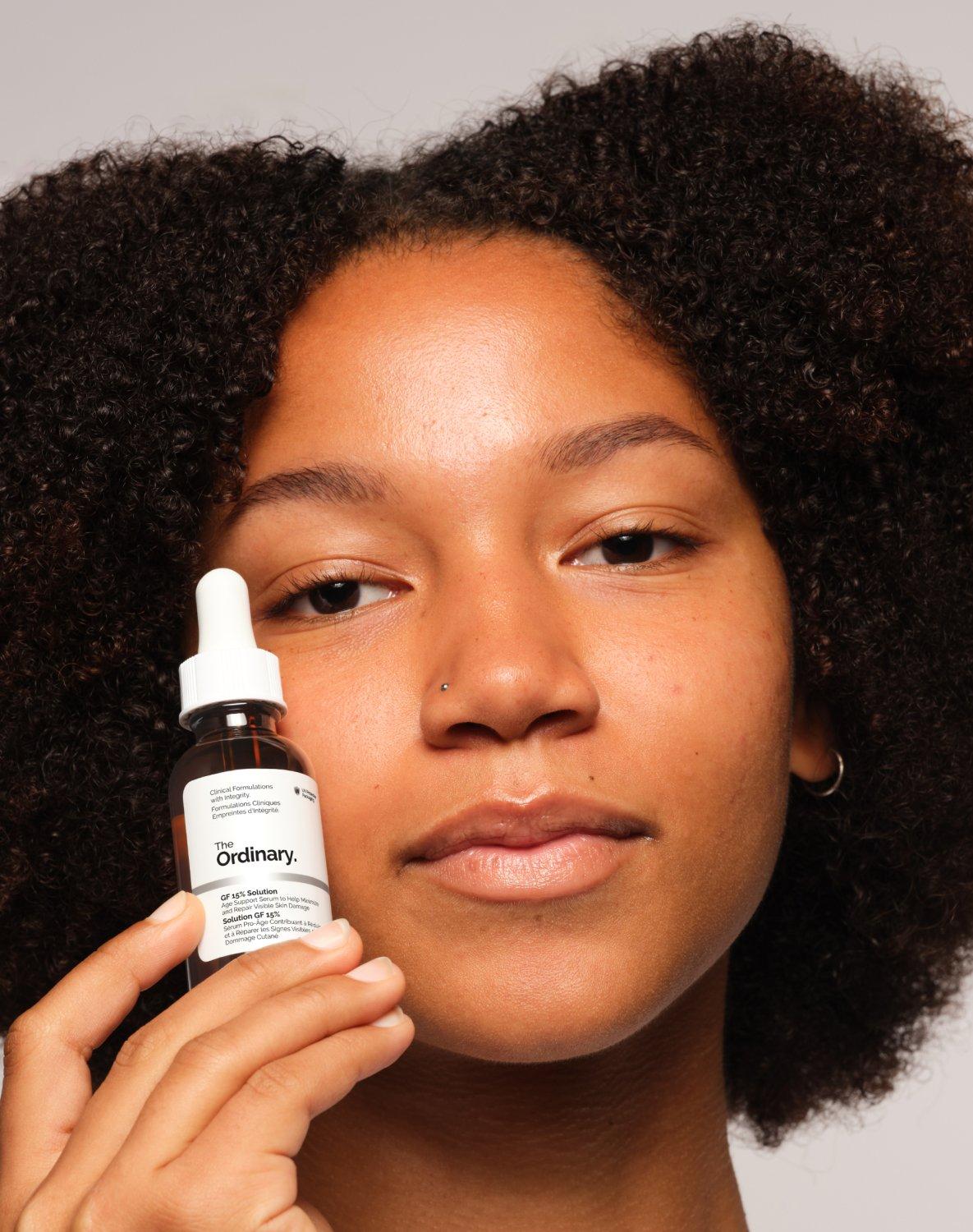 Person holding The Ordinary GF 15% Solution