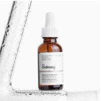 The Ordinary retinol bottle standing on a surface