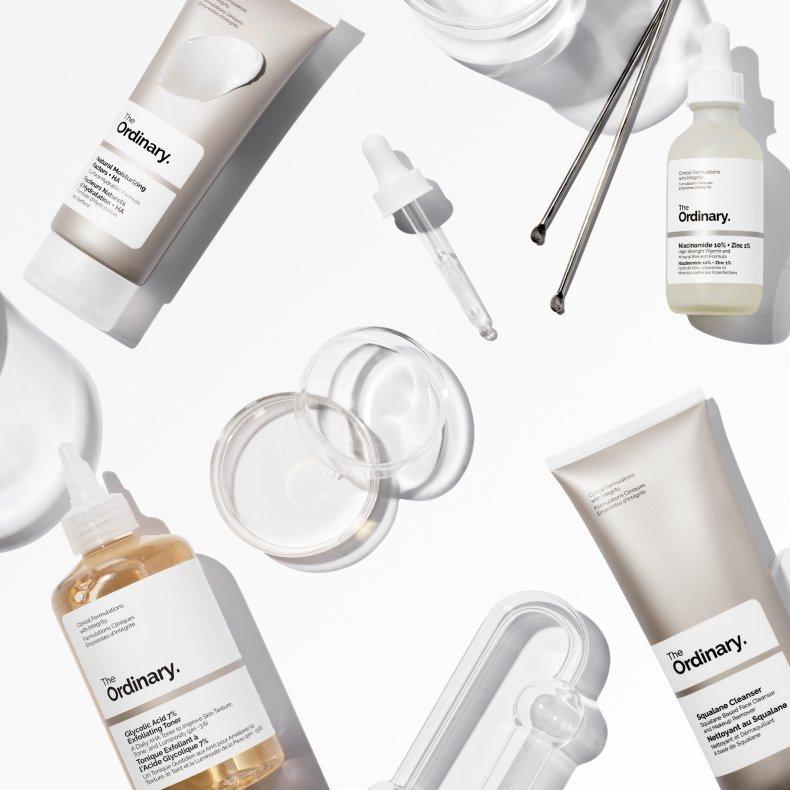 The Ordinary Products displayed on two glass shelves