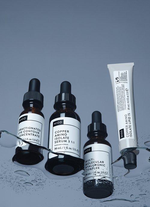 NIOD skincare products MMHC2, CAIS3, CAIL, and FECC