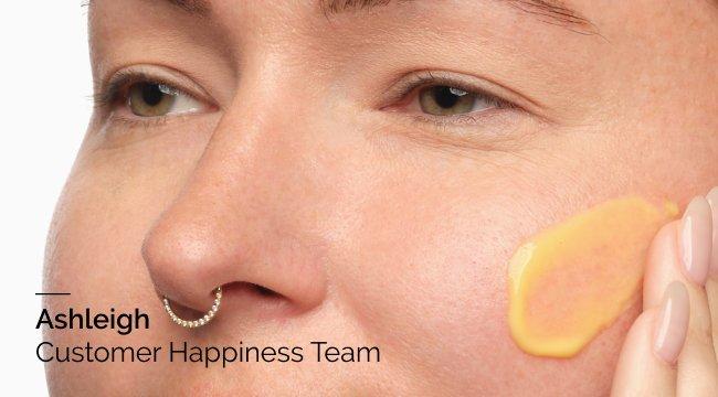 Person applying Retinal 0.2% Emulsion to a side of their cheek